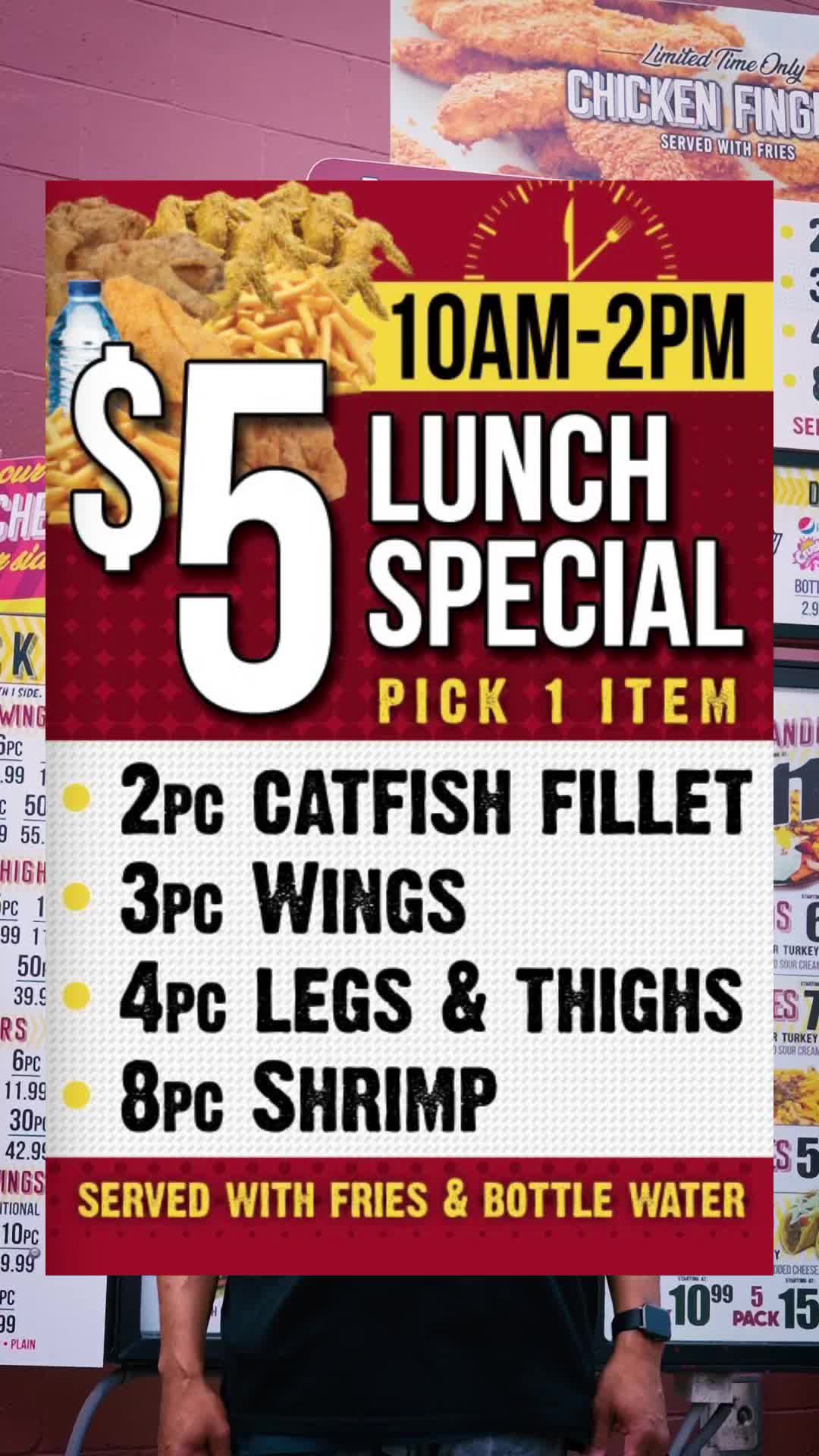 Lunch special flyer held up at the drive-thru window